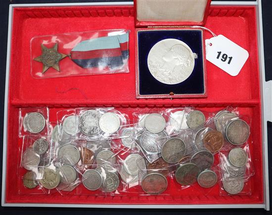 A cased medal and group of coins